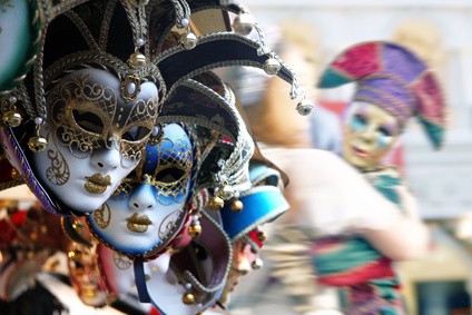 Row of venetian masks in gold and blue