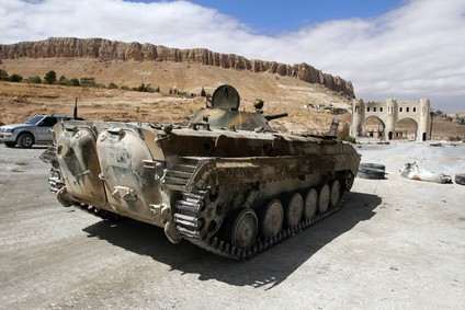 Infantry fighting vehicle of the Syrian National Army near the entry to Ma'loula town, Syria, September 2013