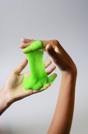 Pate slime elastic and viscous on child's hand